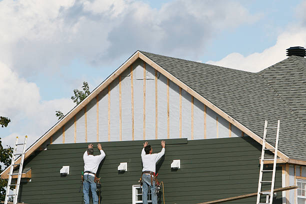 Professional Siding Repair technician working in Worton, MD